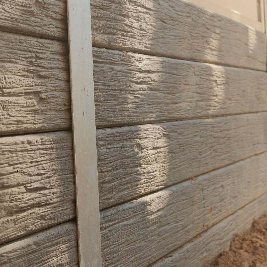 Concrete sleeper retaining wall Springfield QLD — MJ GreenGuard