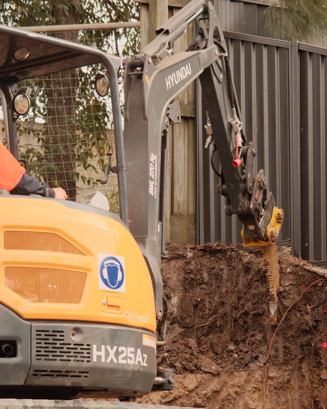 Two-tier retaining wall Springfield Lakes QLD — MJ GreenGuard Landscaping